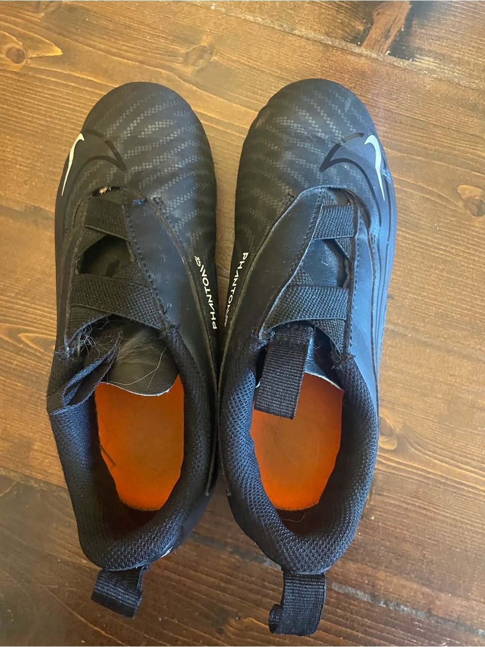 Nike Black Soccer Cleats with Orange Insole